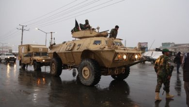 Afghan security personnel outside the Marshal Fahim academy in Kabul