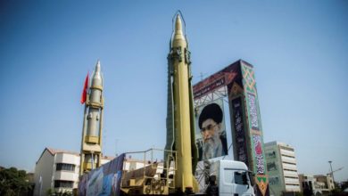 A display featuring missiles and a portrait of Iranian Supreme Leader Ayatollah Ali Khamenei is seen at Baharestan Square in Tehran on September 27, 2017.