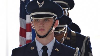 US Air Force Airman 1st Class Kalib Bailey, 325th Fighter Wing Honor Guard member, stands at attention prior to the 325th Medical Group change of command ceremony