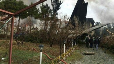 Aftermath of an Iran army Boeing 707 cargo plane crash near Tehran