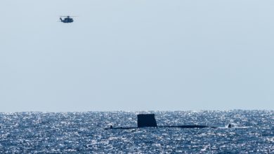 IONIAN SEA, Feb 25, 2018. HMCS Toronto helicopter flies over ESPS Tramonrana in Dynamic Manta 2019