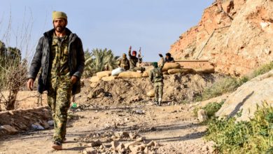 SDF fighters in Baghuz, Syria