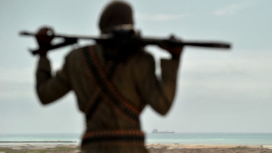 A pirate holding a weapon.