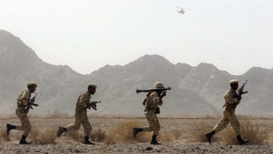 Iranian soldiers participate in drills near the Pakastani border