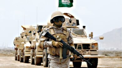 A member of the Saudi forces stands to attention during a presidential visit in Yemen.
