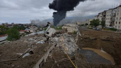 The aftermath of a shelling during the Armenia-Azerbaijan conflict in the Nagorno-Karabakh region.