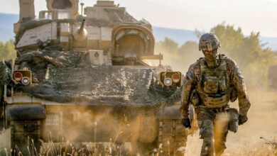 A Soldier guides a M2A3 Bradley Fighting Vehicle during an exercise at Novo Selo Training Area, Bulgaria, Aug. 23, 2018
