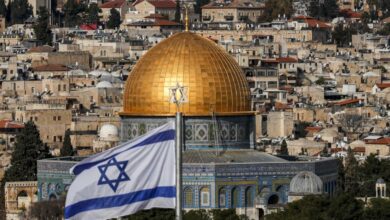 An Israeli flag flies in Jerusalem on 27 January, 2020.