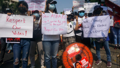 Protesters take part in a demonstration against the military coup in front of the Indonesian embassy in Yangon