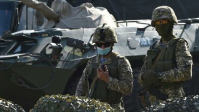 Kyrgyzstan soldiers at a checkpoint on the outskirts of Bishkek