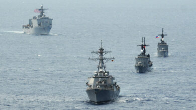 The Arleigh Burke-class destroyer USS John S. McCain (DDG 56), the Philippine navy frigate BRP Gregaorio del Pilar (PF-15), the Philippine navy frigate BRP Ramon Alcaraz (PF-16) and the Whidbey Island-class amphibious dock landing ship USS Ashland (LSD 48) steam in formation during Cooperation Afloat Readiness and Training (CARAT) Philippines 2014.