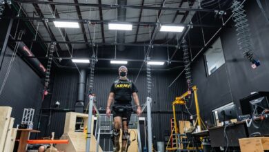 1- Sgt. Maj. Luke Blum, who serves as the DEVCOM acting command sergeant major and the senior enlisted leader for ARL, dons the ExoBoot as part of a study that analyzes how humans and autonomous systems adapt to each other