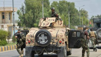 Afghan soldiers arrive in a Humvee vehicle outside a prison during a raid in Jalalabad, Afghanistan, Augustus 3, 2020.