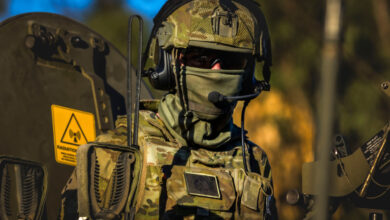 Australian Army Lieutenant coordinates the replenishment of Charlie Company at Townsville Field Training Area during Exercise Brolga Run, August 13, 2020