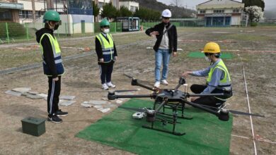 men testing their drone