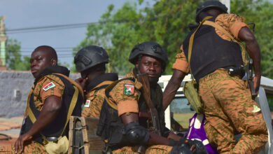 Burkinabe gendarmes in their vehicle.