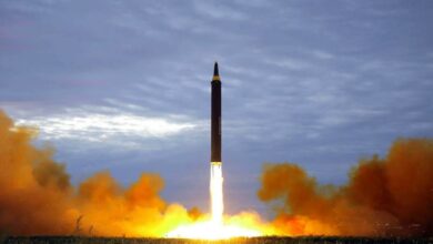 An intermediate-range strategic ballistic rocket Hwasong-12 lifting off from the launching pad