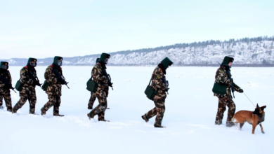 Chinese paramilitary police border guards train in the snow at Mohe County in China's northeast Heilongjiang province, on the border with Russia, December 2016