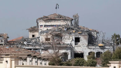 A picture taken on March 13, 2022, shows a view of a damaged building after an overnight attack in Arbil, the capital of the northern Iraqi Kurdish autonomous region