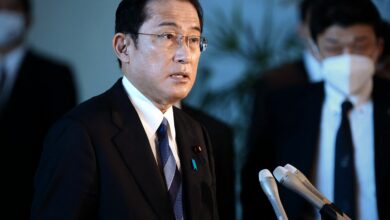 Japan's Prime Minister Fumio Kishida speaks to reporters