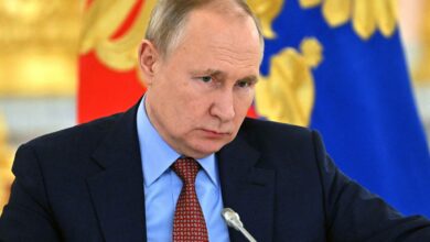Russian President Vladimir Putin attends a meeting