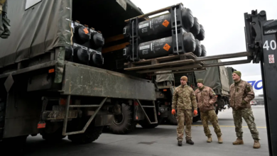 Ukrainian troops load a truck with US-made Javelins anti-tank missiles