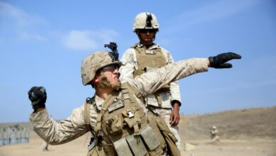 US Marine throws a practice M67 fragmentation grenade during a live-fire exercise