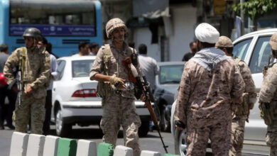 Iranian Revolutionary Guards outside the Iranian parliament