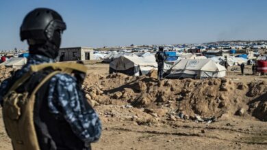 Syrian Democratic Forces keep watch in the vicinity of al-Hol camp.