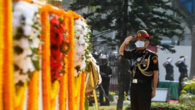 A file photo shows then-Commanding-in-Chief Eastern Command of Indian Army Lieutenant General Anil Chauhan salutes during a ceremony to mark “Vijay Diwas"