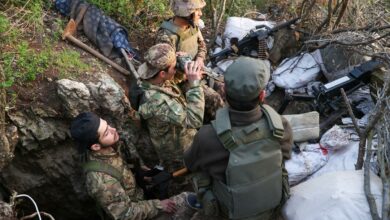 Fighters affiliated to the Hayat Tahrir al-Sham (HTS) militant group in the countryside of Syria's northwestern Latakia province