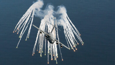 A C-17 Globemaster III aircraft dispenses flares