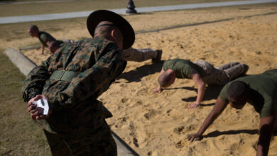 Staff Sgt. Angel Olmo, a drill instructor of Platoon 1001, Alpha Company, 1st Recruit Training Battalion, works to instill discipline in his recruits during an incentive training session Nov. 14, 2013, on Parris Island, S.C. Incentive training consists of physical exercises administered in a controlled and deliberate manner and is used to correct minor disciplinary infractions. Olmo is a 27-year-old native of Kissimmee, Fla. Alpha Company is scheduled to graduate Jan. 24, 2014. Parris Island has been the site of Marine Corps recruit training since Nov. 1, 1915. Today, approximately 20,000 recruits come to Parris Island annually for the chance to become United States Marines by enduring 13 weeks of rigorous, transformative training. Parris Island is home to entry-level enlisted training for 50 percent of males and 100 percent of females in the Marine Corps. (Photo by Lance Cpl. MaryAnn Hill)