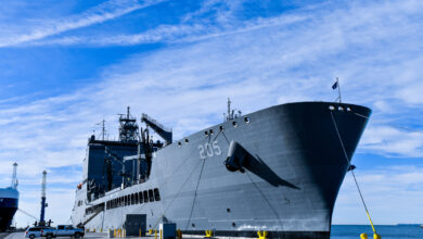 USNS John Lewis (T-AO 205) sits pierside at Naval Surface Warfare Center, Port Hueneme Division (NSWC PHD), Friday, Nov. 4. The U.S. Navy fleet replenishment oiler, delivered to Military Sealift Command in July, is in the beginning months of its year-long ship qualification trials schedule and stopped by NSWC PHD for a stores resupply and minor repairs by builder representatives. The Underway Replenishment (UNREP) fuel and cargo delivery stations aboard the civilian-crewed ship use the new Electric Standard Tensioned Replenishment Alongside Method (E-STREAM) technology, designed by NSWC PHD UNREP engineers. USNS John Lewis is the first oiler to have the new E-STREAM systems on board, and the command’s UNREP team members were excited to see in person the system installed on a ship. (U.S. Navy photo by Dana Rene White/Released)