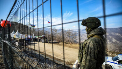 A Russian peacekeeper guarding the Lachin corridor