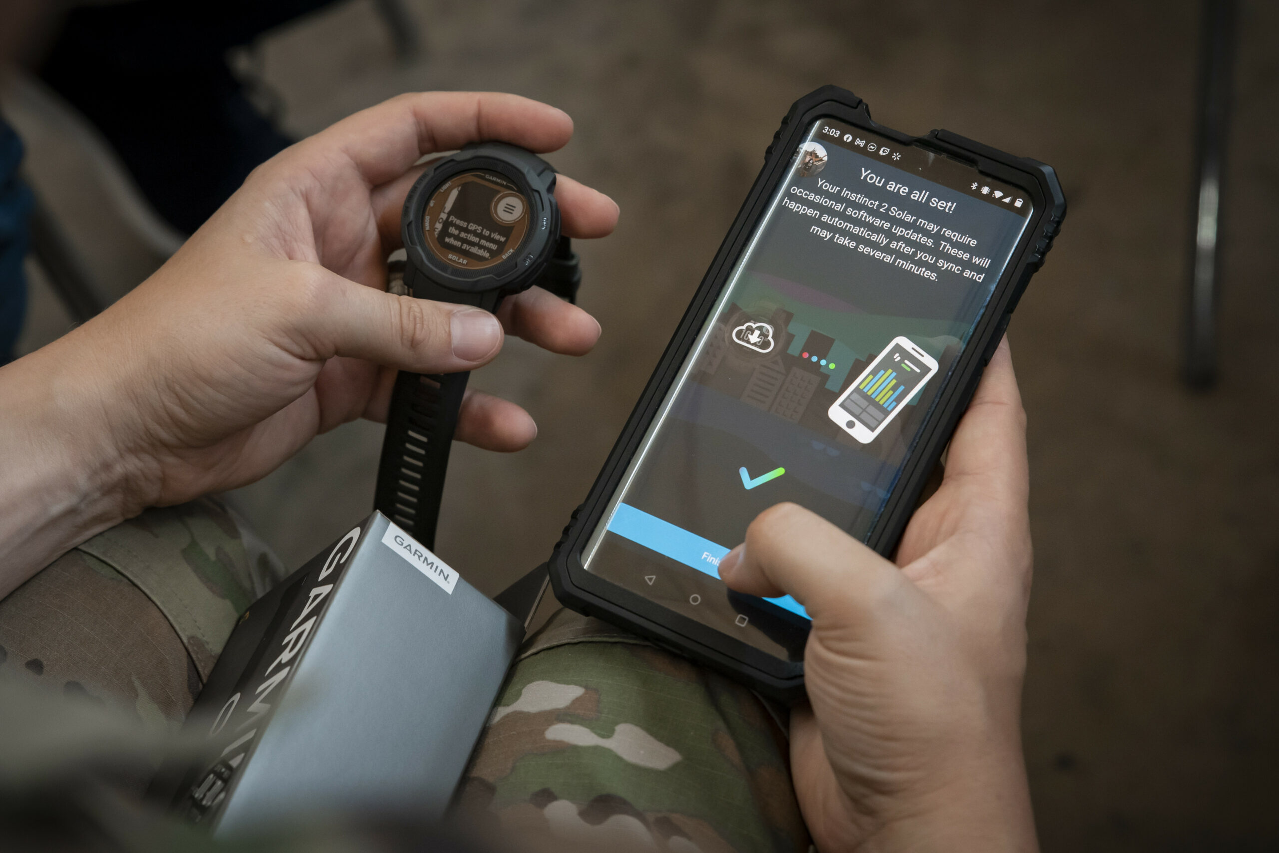 A Guardian syncs data from a wearable device to a phone during a Continuous Fitness Assessment, or CFA, study informational session hosted by an Air Force Research Laboratory team at a facility near Wright-Patterson Air Force Base, Ohio, June 8, 2023. The CFA study is a two-year voluntary effort with Guardians to assess the use of wearable fitness devices that measure physical activity. The CFA is part of the U.S. Space Force’s Holistic Health Approach, an initiative that promotes wellness through positive behaviors and seeks to replace traditional military fitness tests with data from continuous monitoring technology. (U.S. Space Force photo / Rick Eldridge).