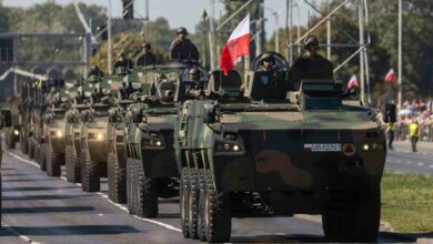 Polish soldiers take part in a military parade in Warsaw