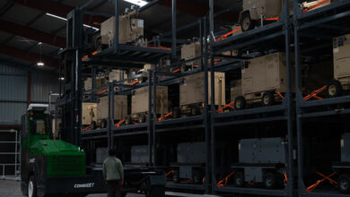 Members of the Warehouses Service Agency operate a forklift to deliver a generator to its holding area at the Central Region Storage Facility in Sanem, Luxembourg, Oct. 12, 2021. During Afghanistan evacuation operations, the CRSF and Warehouses Services Agency volunteered to go into 24/7 operations for the first time in 10 years to support Operation Allies Welcome. (U.S. Air Force photo by Senior Airman Taylor Slater)
