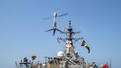 231006-N-HY958-1037 GULF OF OMAN (Oct. 6, 2023) An Aerovel Flexrotor unmanned aerial vehicle launches from the deck of the Arleigh Burke-class guided-missile destroyer USS McFaul (DDG 74) in the Gulf of Oman, in an image released Oct. 6. U.S. 5th Fleet forces recently conducted an operation integrating unmanned platforms with traditionally crewed ships and aircraft to conduct enhanced maritime security operations in the waters surrounding the Arabian Peninsula. Seven task forces falling under U.S. 5th Fleet integrated 12 different unmanned platforms with manned ships for “manned-unmanned teaming” operations tracking Iranian Navy and Islamic Revolutionary Guard Corps Navy (IRGCN) ships and small boats over several days during routine patrols in and around the Strait of Hormuz. (U.S. Navy photo)