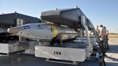 GBU-39 smart bombs prepared to be loaded on to an F-22.
