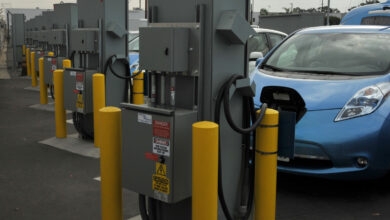 A fleet of plug-in electric vehicles sits ready to roll at Los Angeles Air Force Base in El Segundo, Calif., on Oct. 31, 2014. The new fleet is the first installation in the Department of Defense to replace its entire non-tactical fleet with electric and hybrid vehicles. The electric vehicles will charge directly from the local utility grid enabling Los Angeles AFB personnel to utilize the electric vehicles as transportation within the base. When called-upon, and when connected to the electric vehicle, the bi-directional charging station will switch power flow directions in order to support vehicle-to-grid energy request by discharging the electric vehicle’s onboard battery. (U.S. Air Force photo by Sarah Corrice/RELEASED.)
