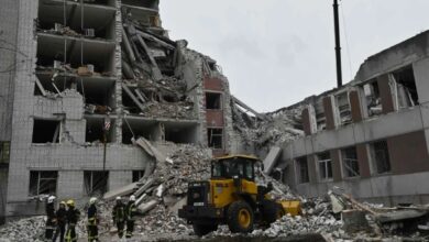 Ukrainian rescuers clear the rubble of a destroyed building following a missile attack on Ukraine s Chernigiv on April 17, 2024