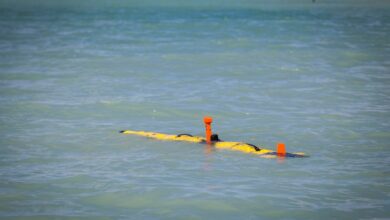 An Iver3-580 Autonomous Underwater Vehicle surfaces in Kaneohe Bay during an informational brief aboard Marine Corps Base Hawaii, Sept. 6, 2017. The AUV was demonstrated by the Naval Research Laboratory and 3rd Reconnaissance Battalion for senior leaders with Marine Corps Forces, Pacific. The system is a state of the art autonomous device that could help provide amphibious units with quick and accurate underwater survey data. (U.S. Marine Corps photo by Cpl. Jesus Sepulveda Torres)