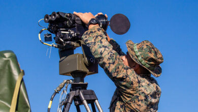 U.S. Marine Corps Lance Cpl. Andre Hernandez, a Surveillance Sensor Operator with 2nd Ground Support Platoon, Ground Surveillance Company, 2nd Intelligence Battalion, II Marine Expeditionary Force Information Group, operates the Ground Based Observational Surveillance System (GBOSS) at Marine Corps Auxiliary Landing Field Bogue, N.C., on Nov. 16, 2021. The GBOSS is used to detect and track movement in field environments. (U.S. Marine Corps photo by Cpl. Alexander Ransom)