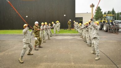 Members of the Texas Air National Guard's 149th Civil Engineering Squadron, a subordinate unit of the 149th Fighter Wing, based at Joint Base San Antonio - Lackland, Texas, help assemble a steel-frame structure at the Norwegian Military Academy (Krigsskolen), at Camp Linderud, in Oslo, Norway, Aug. 16, 2013. The 149th Fighter Wing's 149th Civil Engineering Squadron was in Norway as part of the U.S. National Guard Bureau's deployment for training program to train with members of the Royal Norwegian armed forces. (U.S. Air National Guard photo by Staff Sgt. Phil Fountain / Released)