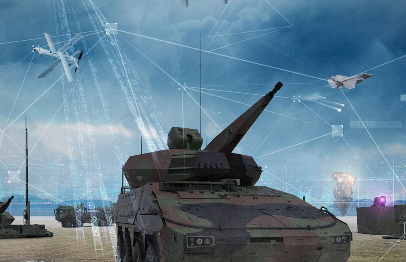 A Skyranger 30 short-range turret system is seen in the middle of the foreground. A network of missile defense systems, sensors and radar are seen on the background, all connected to the Skyranger via artist-rendered lines meant to show how all of the capabilities work hand-in-hand with each other. Numbers, letters and symbols are seen along these lines as well.
