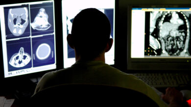 Maj. Michael Matchette, 332nd Expeditionary Medical Support Squadron radiologist, reviews computed tomography scans from a trauma patient to determine the severity of the injuries at the Air Force Theater Hospital, Feb. 20. The CT scan process goes directly from the scanning machine to the computer, which allows doctors to diagnose medical problems faster. Matchette is deployed from Lackland Air Force Base, Texas.
