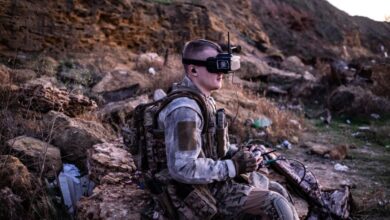 Ukrainian soldier testing his first-person view drone in a training field in Kherson region