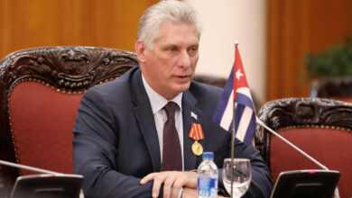 (FILES) In this file photo taken on November 09, 2018 Cuba's President Miguel Diaz-Canel Bermudez (C) speaks during a meeting with Vietnamese Prime Minister Nguyen Xuan Phuc (not pictured) at the Government Office in Hanoi. - Born after the victory of the 1959 revolution, Miguel Diaz-Canel, president and now first secretary of the Communist Party, embodies the new generation in power in Cuba, more connected but not necessarily more flexible. (Photo by LUONG THAI LINH / POOL / AFP)