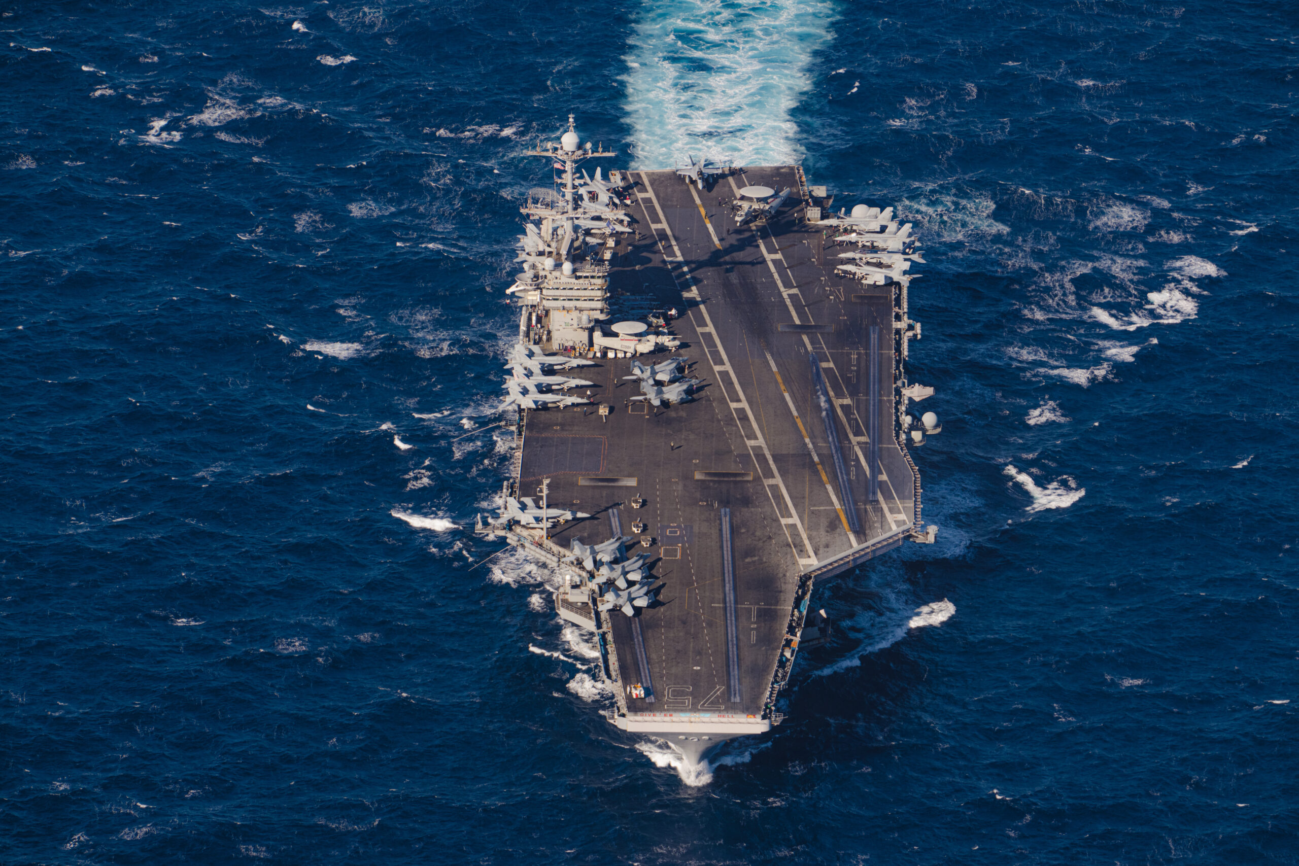 MEDITERRANEAN SEA (Feb. 3, 2022) – The Nimitz-class aircraft carrier USS Harry S. Truman (CV 75) conducts flight operations in the Mediterranean Sea in support of Neptune Strike 2022, Feb. 3. Neptune Strike 2022 highlights NATO’s ability to integrate the high-end maritime capabilities of a carrier strike group to ensure high operational readiness across the Alliance and the defence and protection of all Allies. It is the first time since the Cold War that a full US carrier group comes under NATO command.(Photo by French Master Sergeant Malaury Buis)